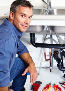 plumber checking concealed pipe leak in Cape Town property