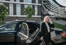 Executive using luxury chauffeur service in Cape Town for professional business travel
