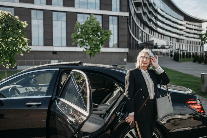 luxury-chauffeur-service-cape-town Executive using luxury chauffeur service in Cape Town for professional business travel