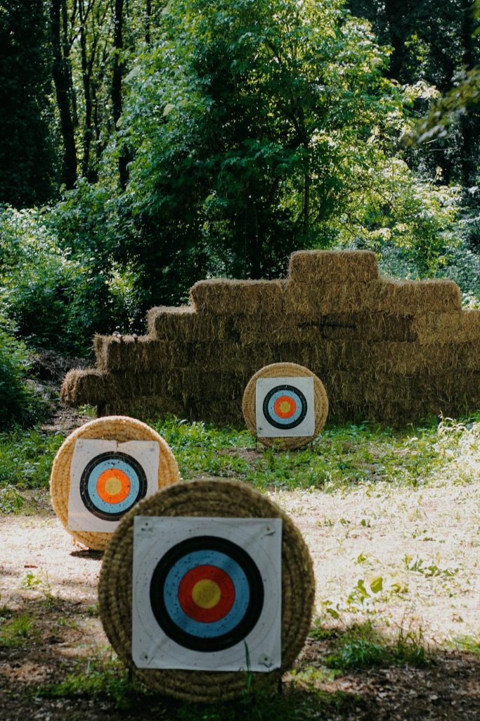 Outdoor slingshot targets set up for structured practice in an open range environment